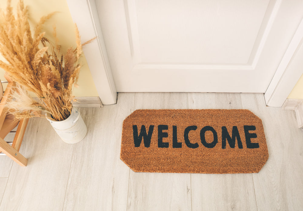 Welcoming home with a door mat