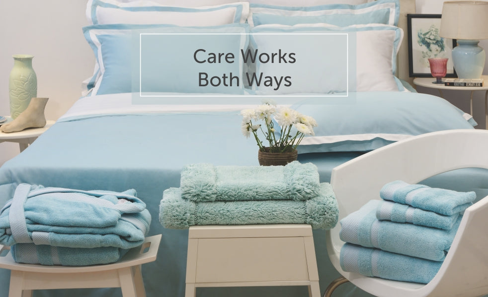 Neatly folded linen showing how to care for bed and bath fabrics.